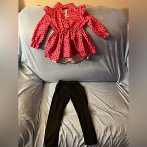 Gently used toddler girls long sleeve pink shirt with black pants